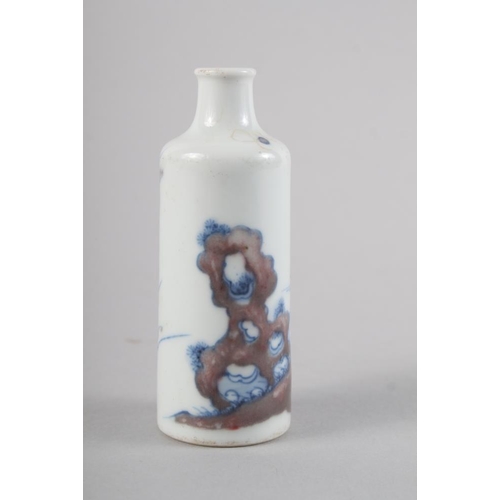 100 - A Chinese porcelain cylindrical snuff bottle, decorated with a fisherman, six character mark to base... 