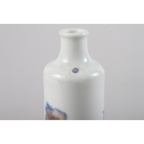 100 - A Chinese porcelain cylindrical snuff bottle, decorated with a fisherman, six character mark to base... 