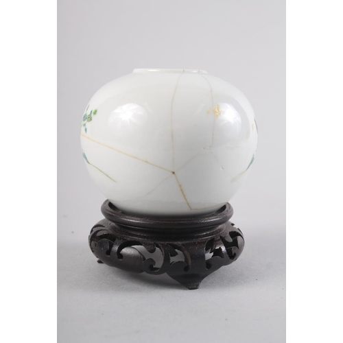 101 - A 19th century Chinese globular brush washer with figure decoration, on hardwood stand, 3