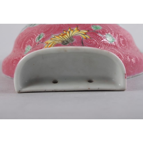 103 - A Chinese porcelain vase-shaped wall pocket with landscape panel on a pink ground, 10 1/2