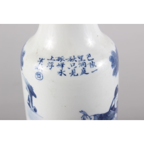 106 - A Chinese blue and white cylindrical vase, decorated figures, six character mark to base, 10