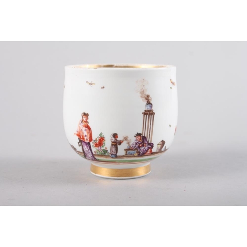 11 - A Meissen 18th century chocolate cup with figure and landscape decoration, 2 1/2