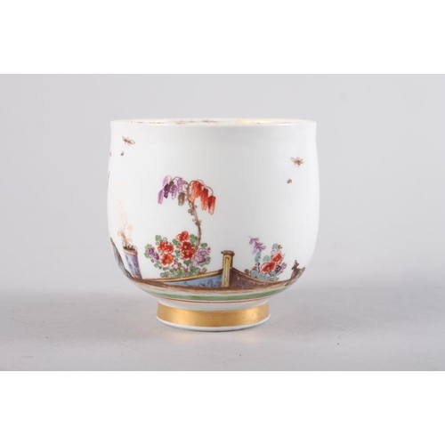 11 - A Meissen 18th century chocolate cup with figure and landscape decoration, 2 1/2