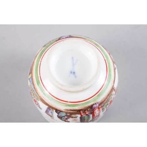 11 - A Meissen 18th century chocolate cup with figure and landscape decoration, 2 1/2