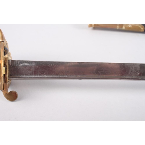 152 - An early 20th century 1827 pattern naval dress sword with knot and scabbard, formerly the property o... 