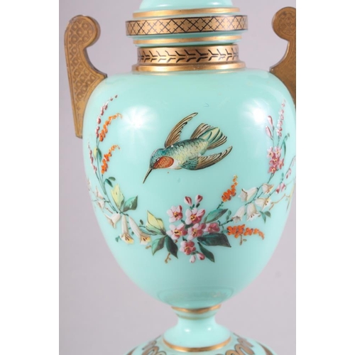 16 - A 19th century Continental green glass and enamelled two-handled vase and cover with bird and flower... 