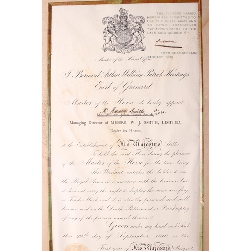 188 - Two early 20th century Royal Warrant certificates, in gilt and brass mounted frames