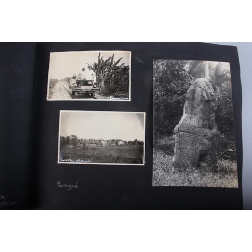 244 - An early 20th century photo album, North and South America, including eruption of Volcano Santa Mari... 