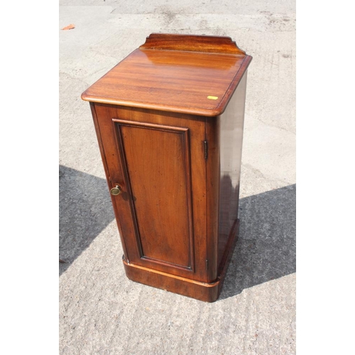 382 - A late 19th century mahogany ledge back bedside cupboard enclosed panel door, on block base, 15