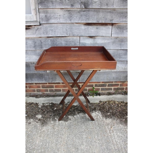 383 - A butler's mahogany tray, on folding stand, tray 32