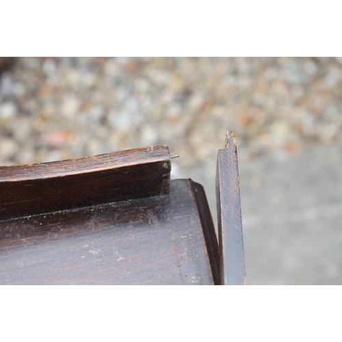 395 - An Edwardian walnut three-drawer music cabinet, on square taper supports, 21