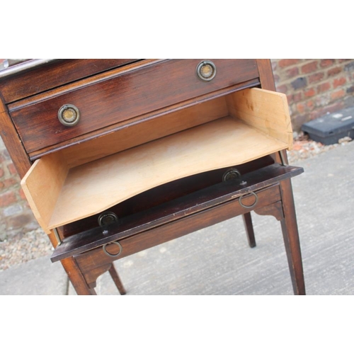 395 - An Edwardian walnut three-drawer music cabinet, on square taper supports, 21