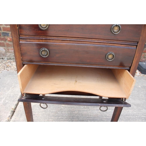 395 - An Edwardian walnut three-drawer music cabinet, on square taper supports, 21