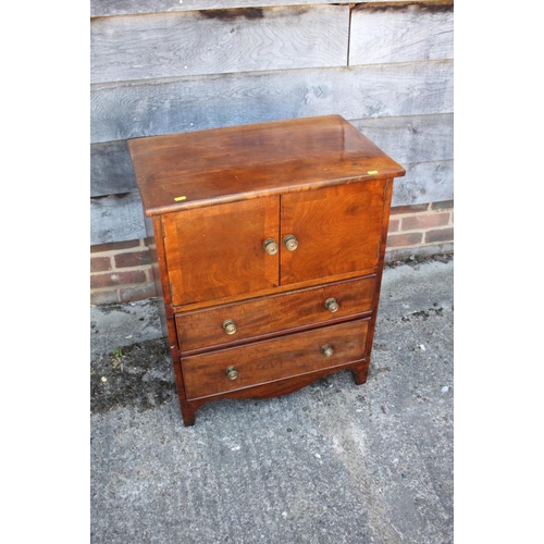 401 - A 19th century bedside cupboard enclosed two doors over two drawers, on bracket feet, 24