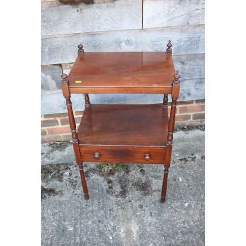 404 - A late 19th century mahogany two-tier washstand, fitted one drawer, on turned supports, 19