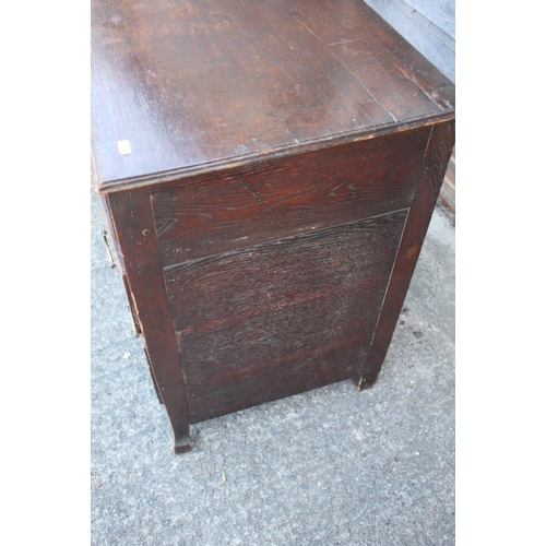 406 - A late 18th century provincial oak chest of three long drawers, on shaped supports, 25