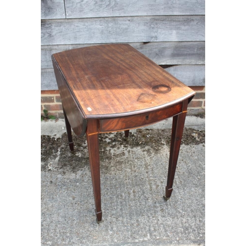 408 - A Georgian mahogany oval Pembroke table, fitted one drawer, on square taper supports and brass casto... 