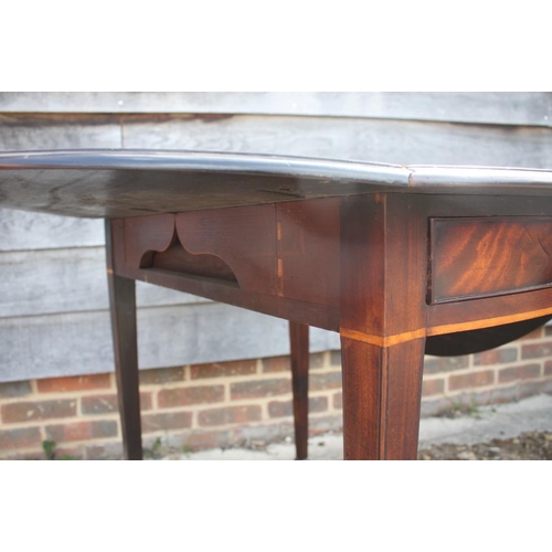 408 - A Georgian mahogany oval Pembroke table, fitted one drawer, on square taper supports and brass casto... 