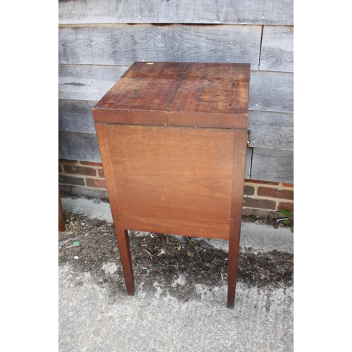 410 - A Georgian mahogany wash stand with fitted interior, over cupboard (drawer missing), 18