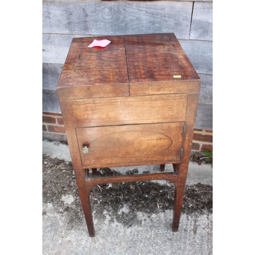 410 - A Georgian mahogany wash stand with fitted interior, over cupboard (drawer missing), 18