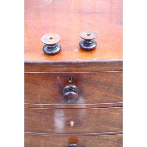 412 - A 19th century mahogany bowfront chest of two short and three long graduated drawers with knob handl... 