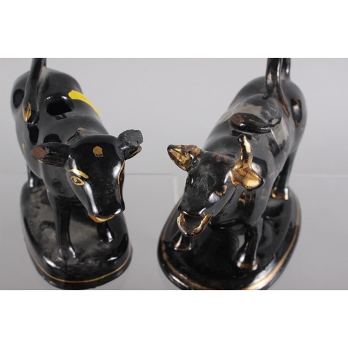 80 - Six 19th century and later model cow creamers, including a German cow creamer with floral decoration... 