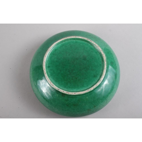 91 - A Chinese green crackle glazed shallow dish, 8 1/2