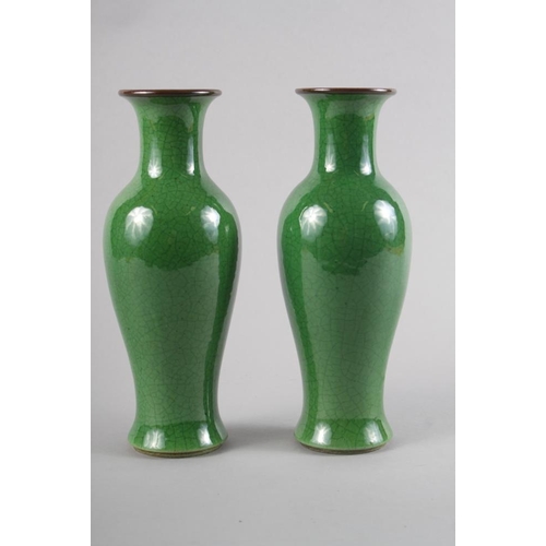 97 - A pair of Chinese  green crackle glazed baluster vases, 9