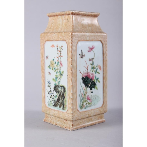 98 - A Chinese porcelain square-section vase, decorated four panels of birds, flowers and insects, 7 1/2