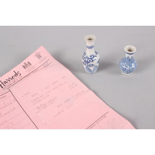 107 - Two Vung Tau Cargo dolls house vases, VT747 and VT758, with certificates of purchase and invoice, la... 