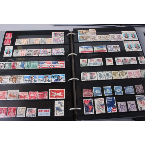 247 - A collection of world stamps, in various albums