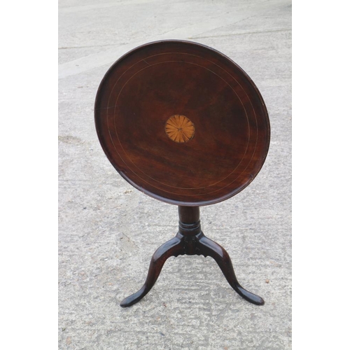 391 - A Georgian mahogany circular fan paterae inlaid tilt top table, on birdcage and turned column tripod... 