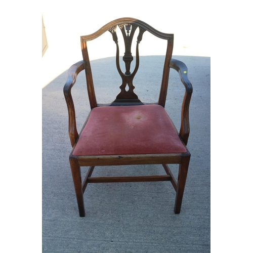 417 - A Sheraton carved mahogany elbow chair with pierced splat and drop-in seat, on square taper stretche... 