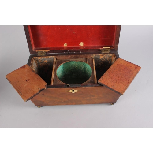 146 - A mahogany cased sarcophagus tea caddy, 11 1/2