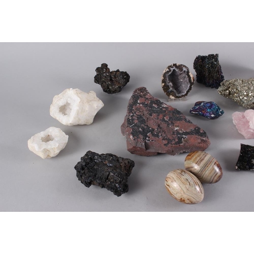 196 - A collection of minerals and geodes, including chalcopyrite, rose quartz, etc