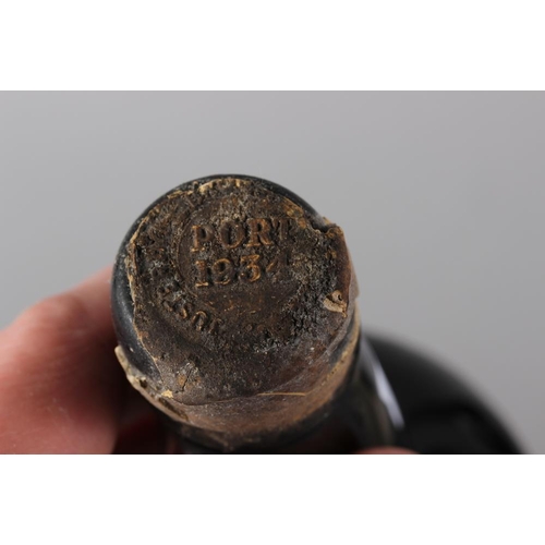 208 - A bottle of Chateau de Beaucastel 2001 Chateauneuf du Pape, a bottle of 1934 port, a Barons de Roths... 