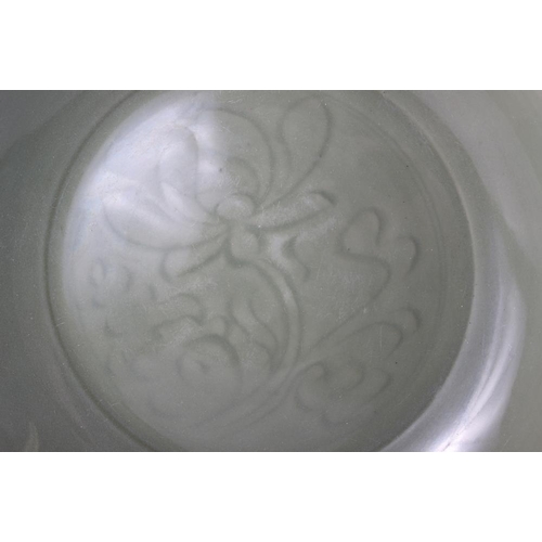 89 - A Chinese celadon glazed charger, 14 1/2