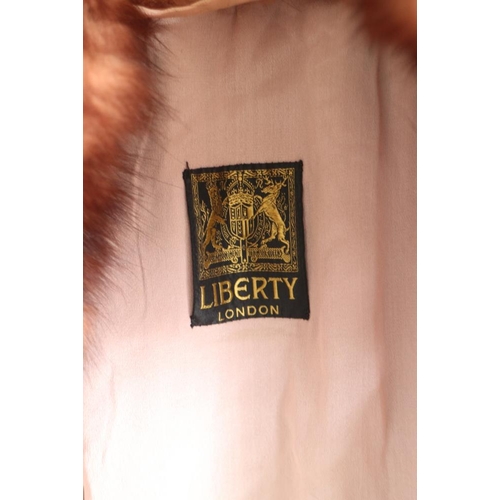 163 - A 1920s Liberty & Co silk opera cloak with floral and embroidered decoration and fur collar