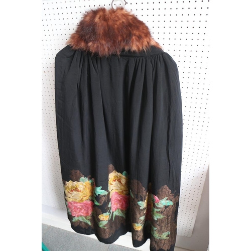 163 - A 1920s Liberty & Co silk opera cloak with floral and embroidered decoration and fur collar