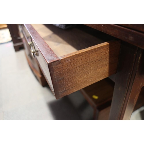 377 - A George III mahogany fold-over top tea table, fitted one drawer, on chamfered and moulded supports,... 