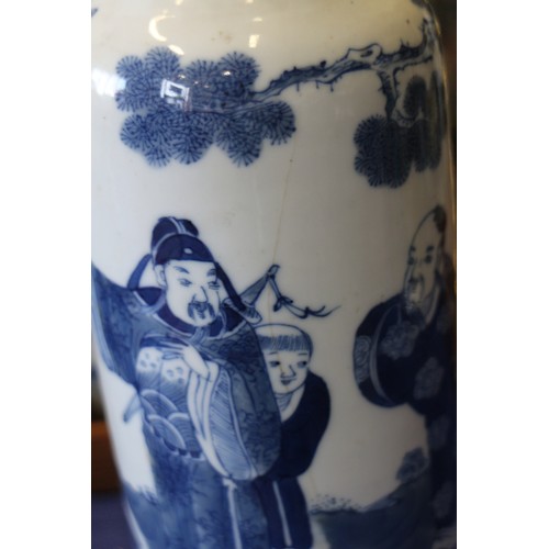 106 - A Chinese blue and white cylindrical vase, decorated figures, six character mark to base, 10