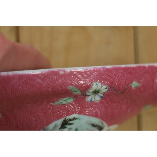 103 - A Chinese porcelain vase-shaped wall pocket with landscape panel on a pink ground, 10 1/2