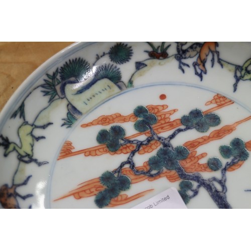 99 - An 18th century Chinese porcelain Doucai shallow dish, decorated flora and fauna, 7 1/2