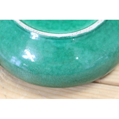 91 - A Chinese green crackle glazed shallow dish, 8 1/2