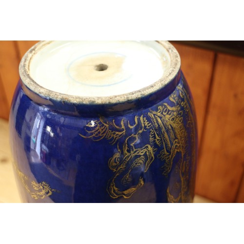 90 - A Chinese blue and gilt decorated Rouleau vase with figure decoration, now converted to a lamp base,... 