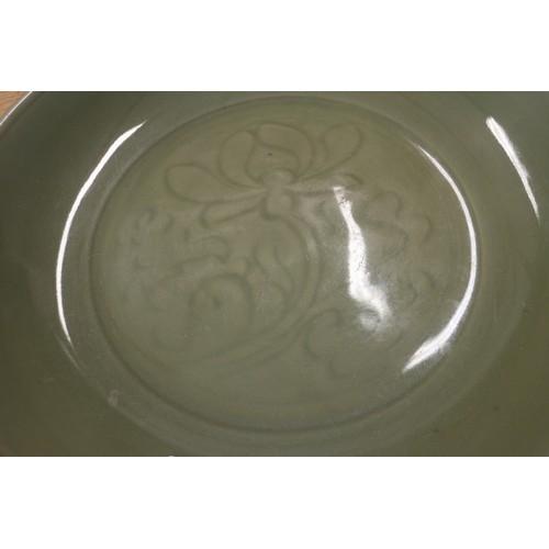 89 - A Chinese celadon glazed charger, 14 1/2