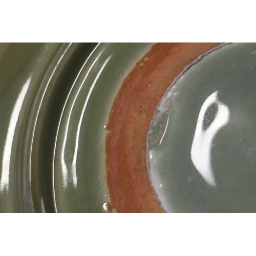 89 - A Chinese celadon glazed charger, 14 1/2