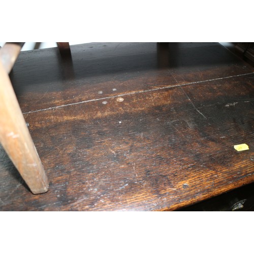 373 - An 18th century oak dresser base, fitted three drawers over pot board, on turned supports, 68