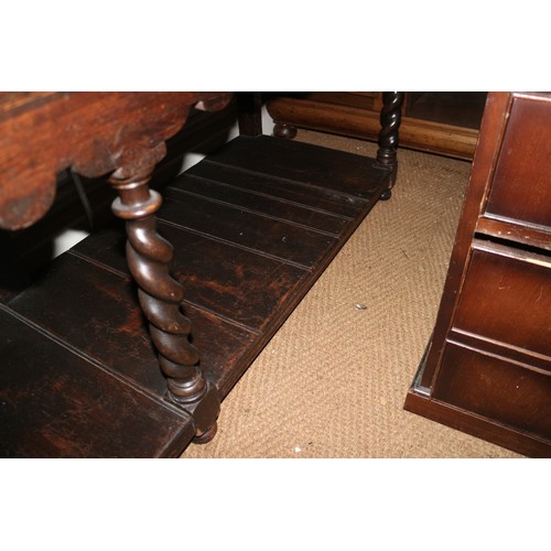 373 - An 18th century oak dresser base, fitted three drawers over pot board, on turned supports, 68