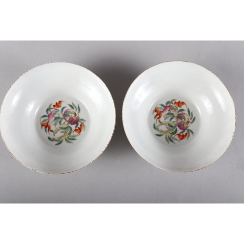 106 - A pair of Chinese porcelain famille verte bowls, decorated with butterflies and flowers, seal mark t... 